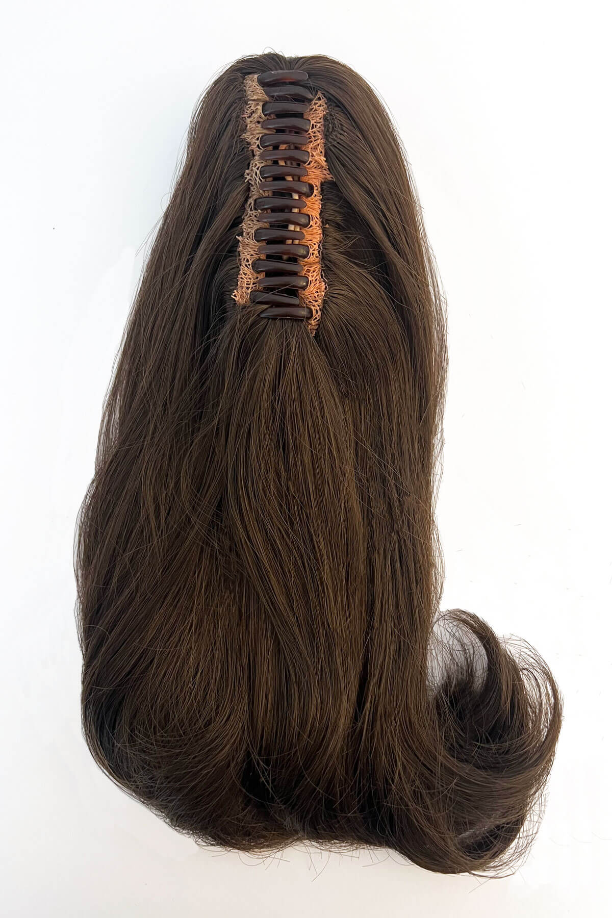 Brown hair extension with a clip on a white background. Ponytail hairpiece, shoulder length with flick/flip, retro 1960s style: Ariana chestnut brown 8