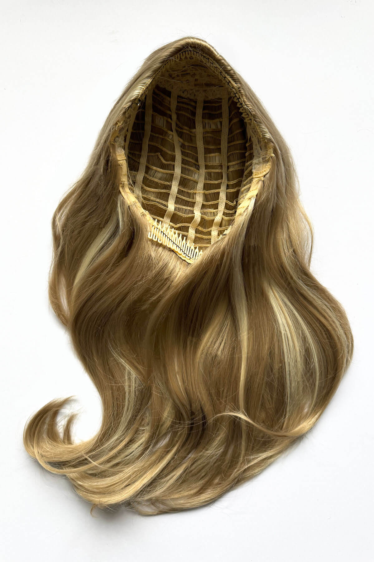 Blonde hair extension on a white background. Half wig hairpiece, long and wavy, Flexihair (Heat styleable) and volume ring for high crown: Sharon blonde 24H613