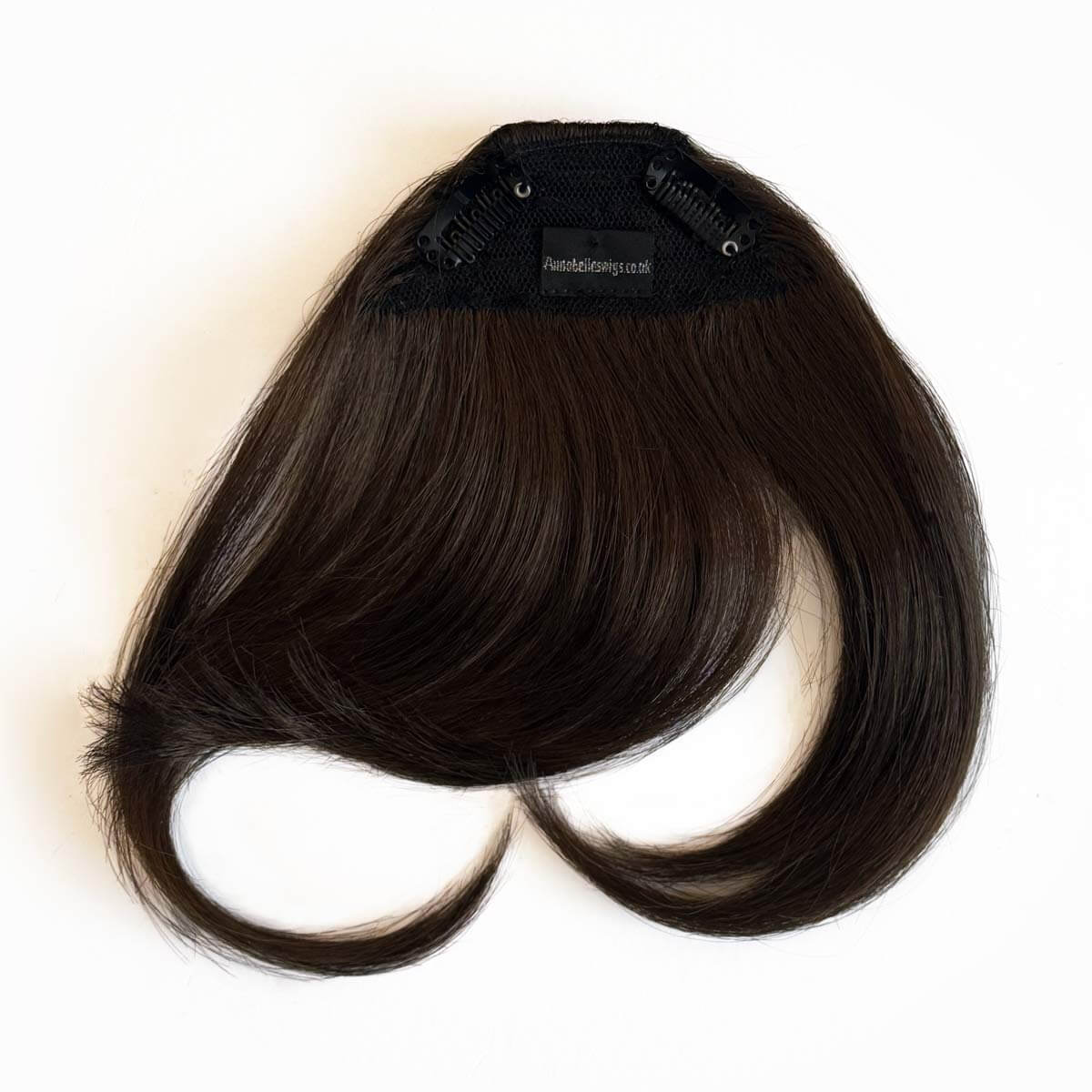 Black hair clip-in extension on a white background. Clip in fringe hairpiece/clip-in curtain bangs, with long, face framing wisps: Sabrina chestnut brown 8