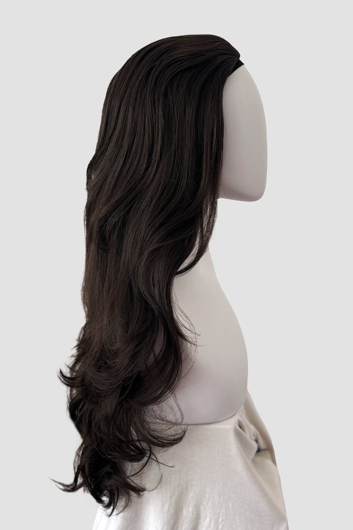 Dark brown half wig on a mannequin. Chelsea - Super Full Volume, Extra Long Loose Curls Brown Half Wig dark brown 4