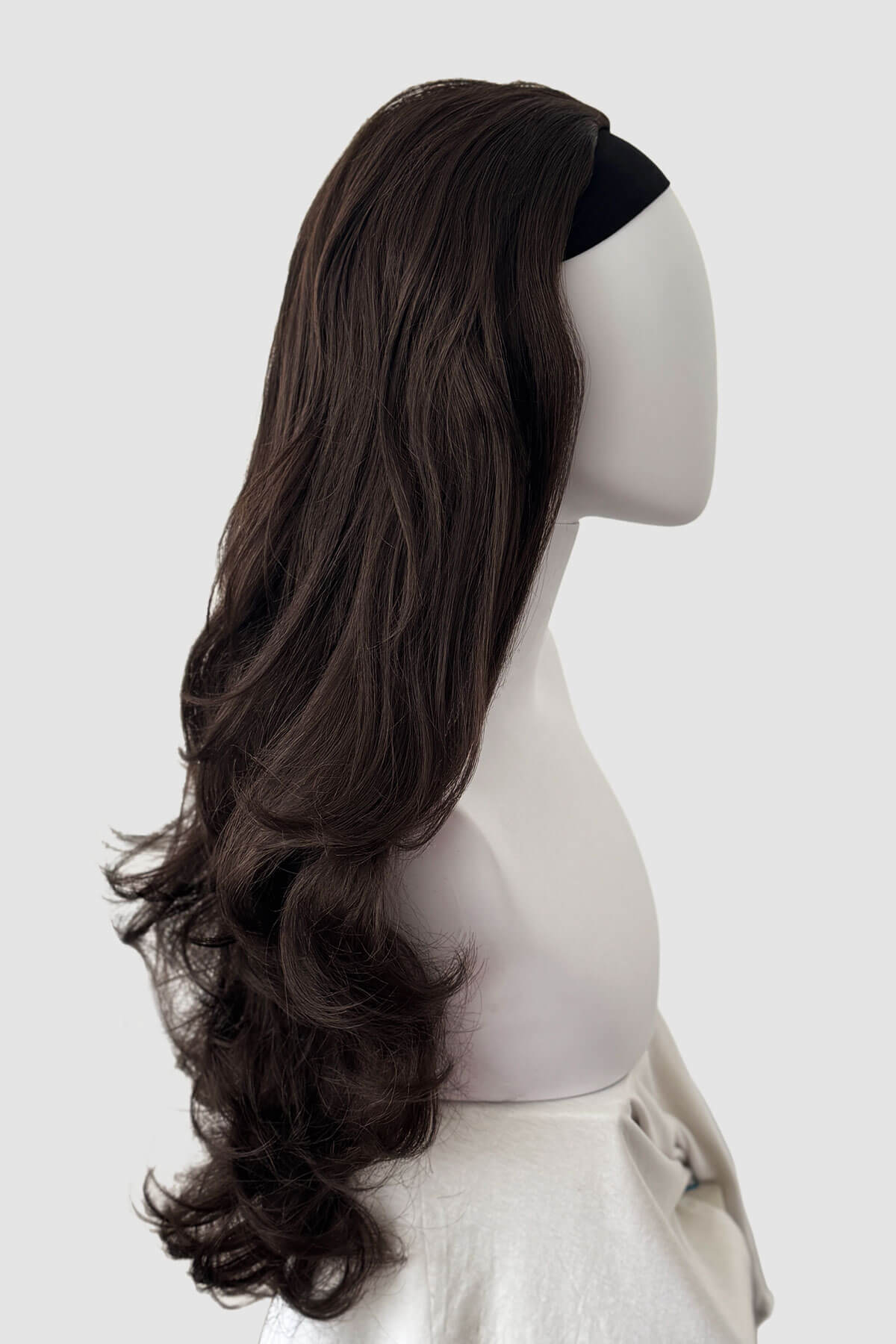 Long brown wig on a mannequin head against a white background. Chelsea - Super Full Volume, Extra Long Loose Curls Brown Half Wig dark chocolate brown 6