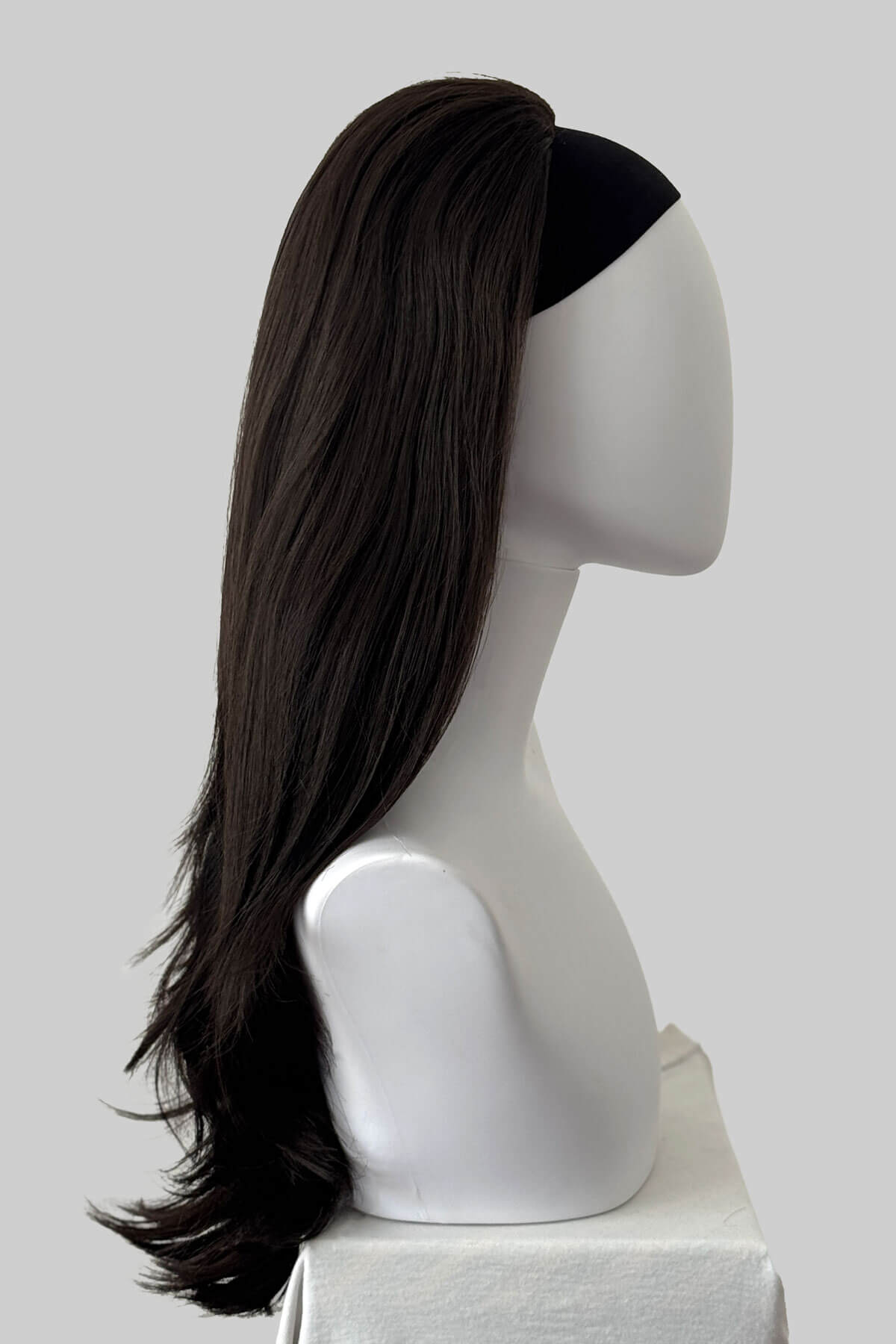 A long dark brown half wig, displayed on a white mannequin against a light grey background. Claudia - Volume Boosting Long Gentle Bouncy Layered Half wig dark brown 4