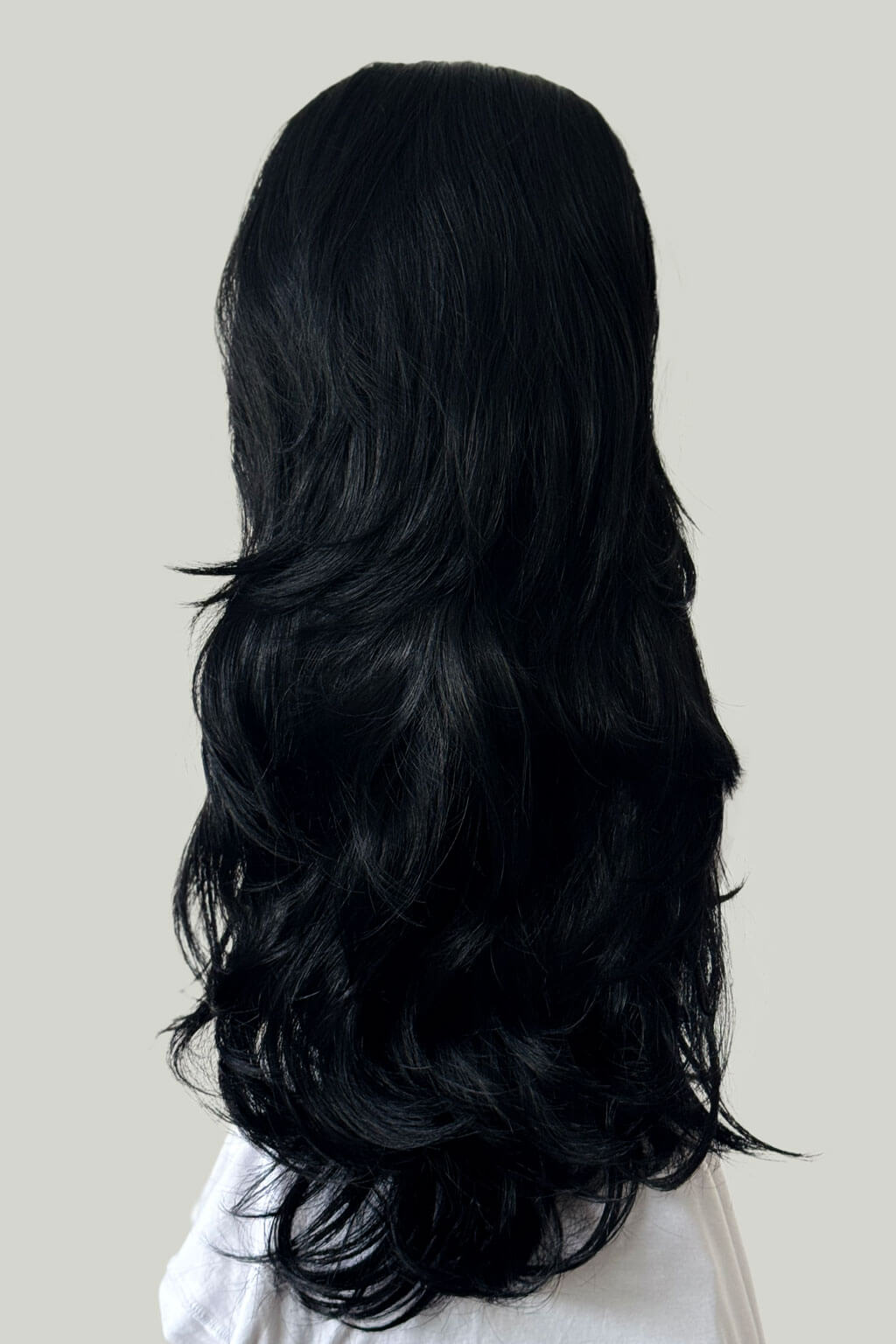 Black wig on a white background. High crown long, layered half wig and volume ring: Helena jet black #1