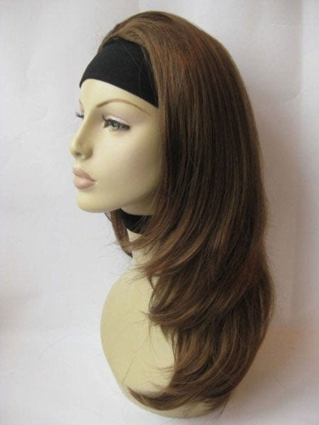 A medium brown wig with side-swept bangs displayed on a mannequin head against a light grey background. Brown half wig hairpiece gently layered: Briar light brown 12