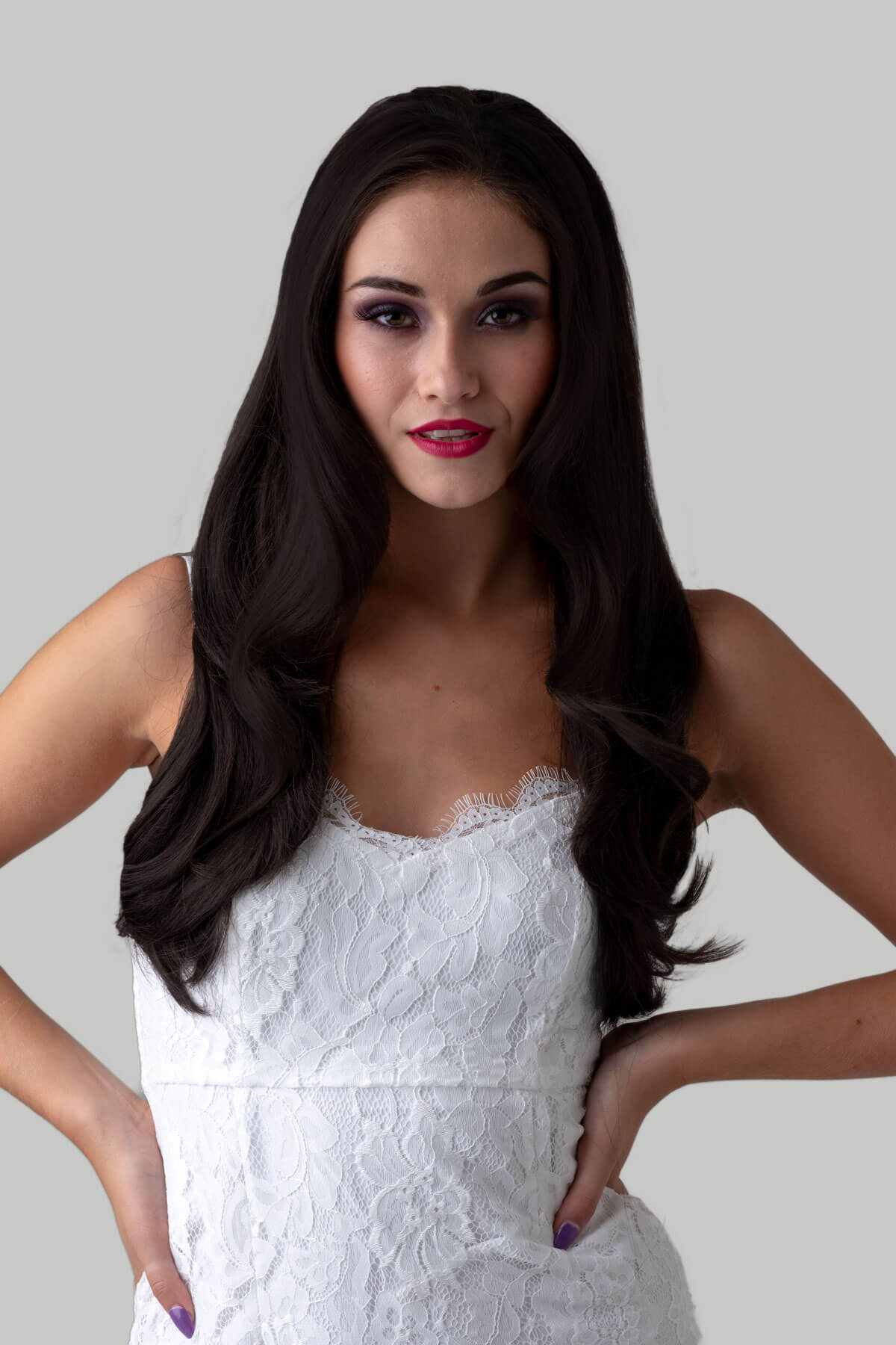 Woman wearing a white lace dress against a gray background. Brown half wig hairpiece, layered and straight: Summer dark brown 4