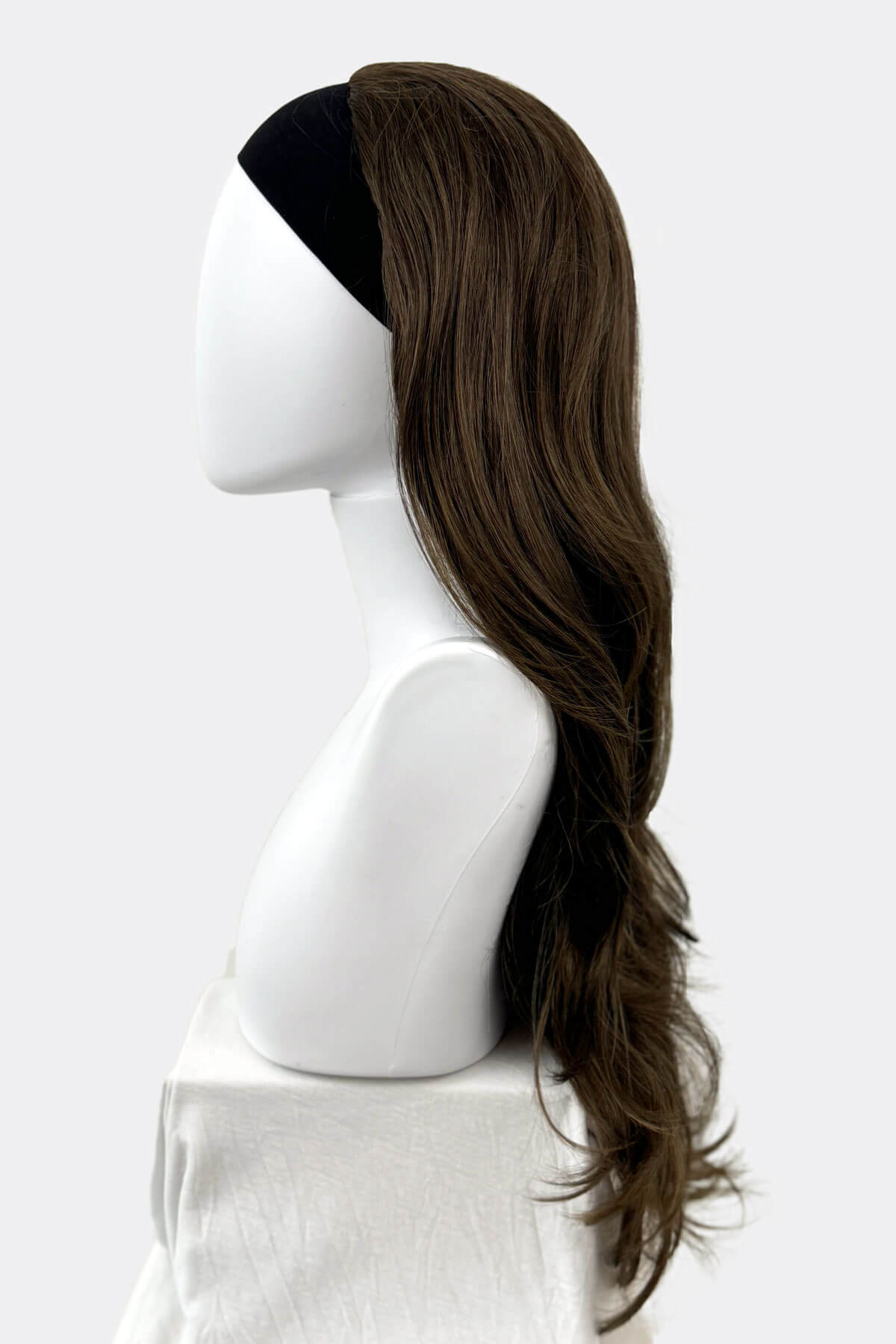 Long brown wig on a white background. Two-tone brown half wig hair piece, loose curls: Laila
