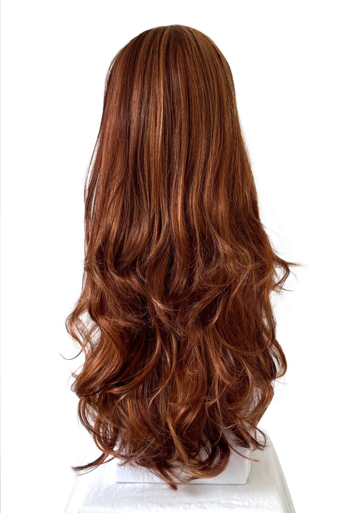 Long, wavy brown hair on a white background. Red half wig (3/4 hairpiece) with long waves: Sasha red auburn blonde BO