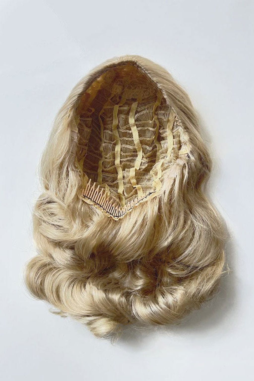 1950s style half wig hairpiece with beautiful waves: Morgana blonde 613T24