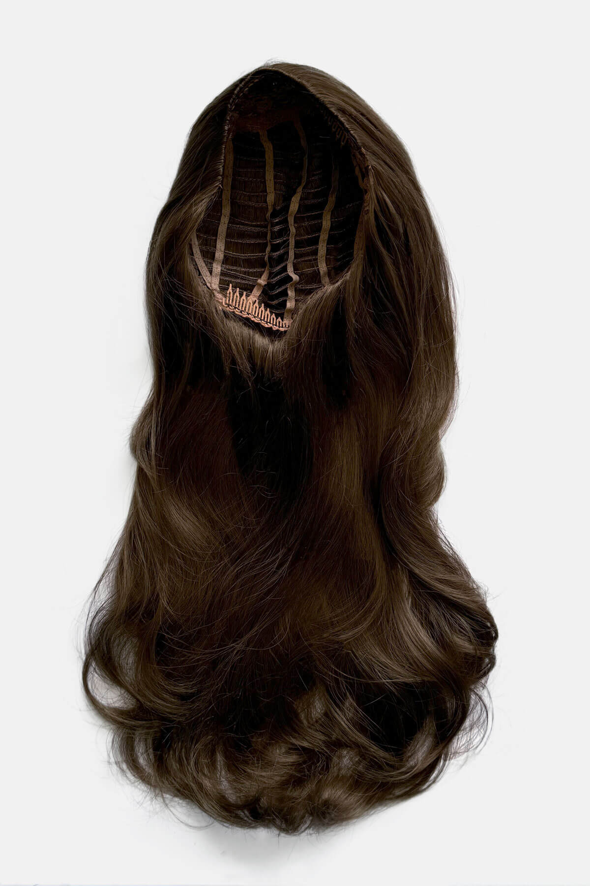 Brown hair extension on a white background. Brown half wig hairpiece (3/4 wig), layered, wavy: Simone mocha brown 10