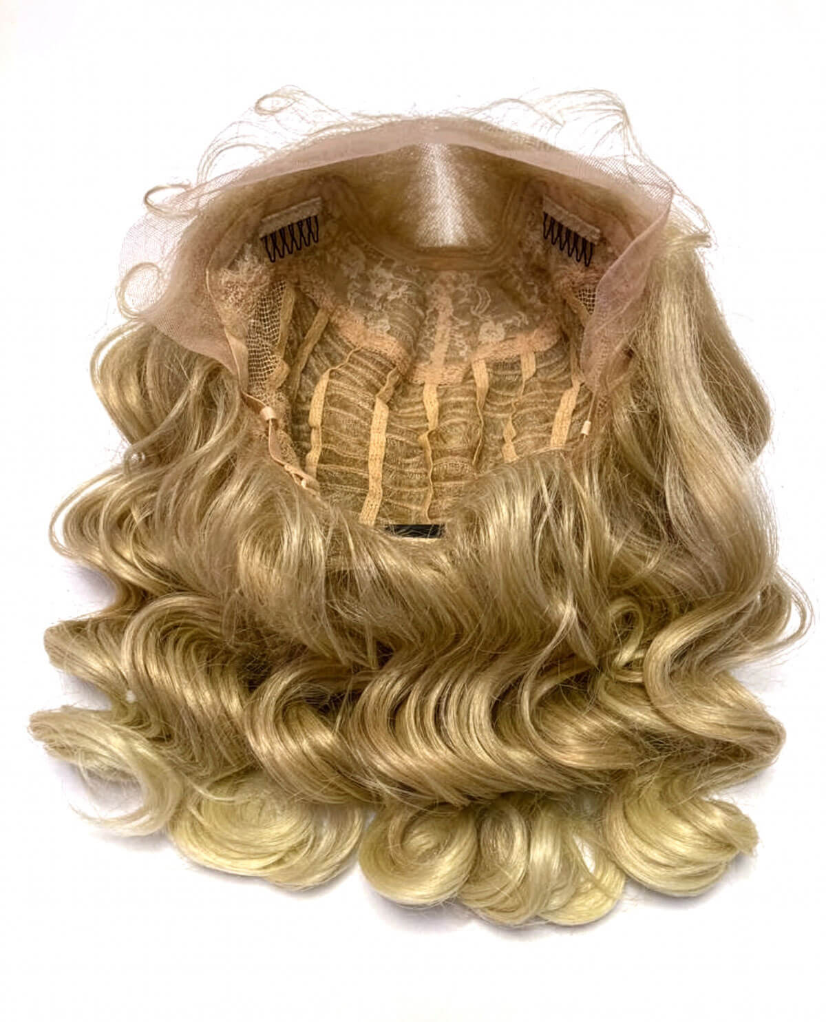 Blonde wig with a clear mesh back on a white background. Blonde pinup wig, lace front: Irina 613t24