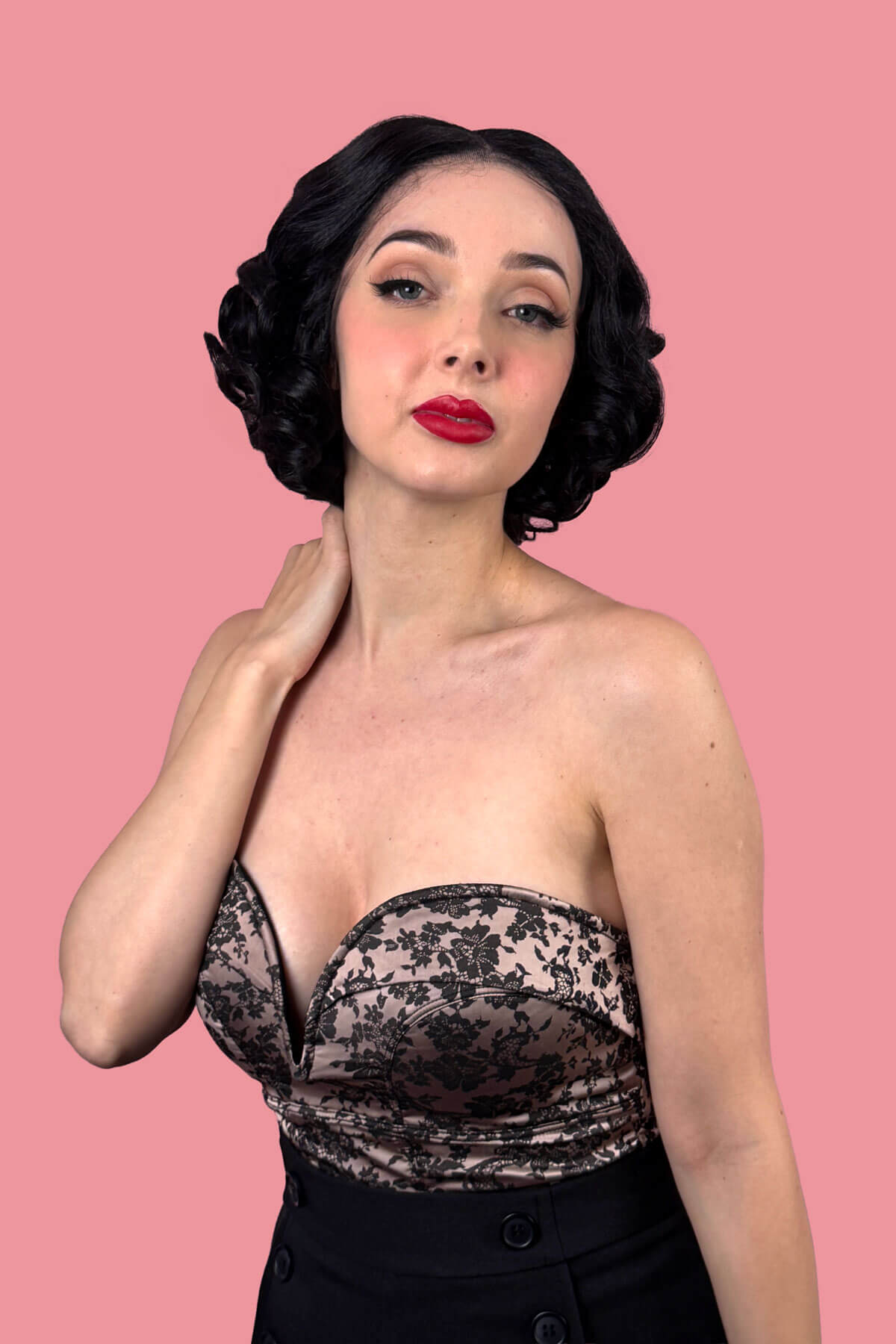 Woman with short black waved hair. Black pinup wig, lace front, vintage style: Halle