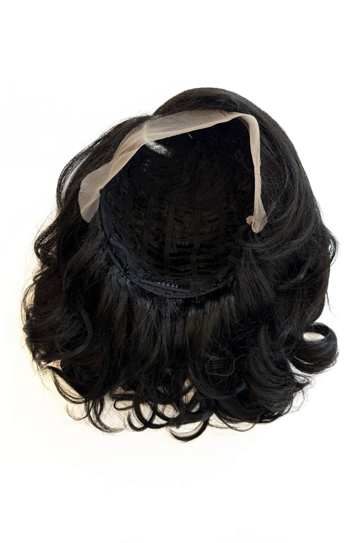 Black hairpiece with a headband on a white background. Black shoulder length long bob (lob) lacefront wig with side sweeping fringe/bangs: Amaris