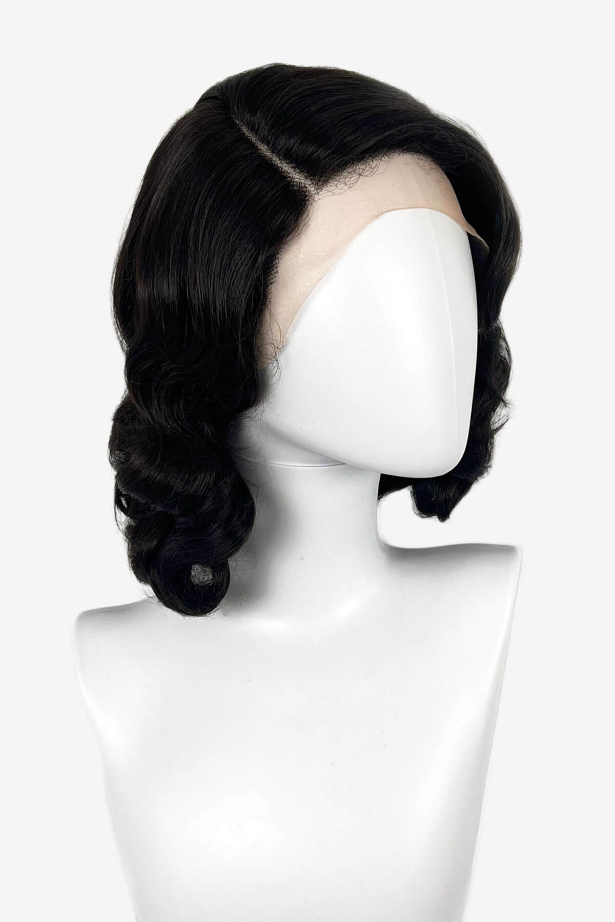 Black wig on a mannequin head against a white background. Brown lacefront wig, pinup/vintage style, mid length with finger waves: Hattie