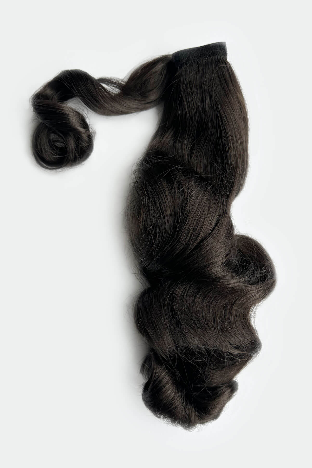 Wavy hair extension on a white background. Retro style ponytail hairpiece, long with vintage waves: Arabella dark brown 4