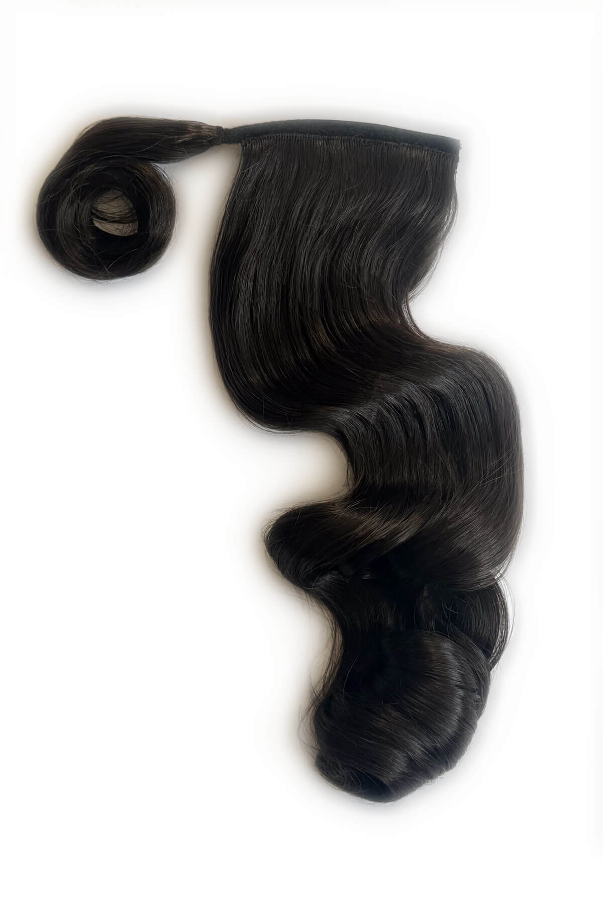 Dark brown hair extensions on a white background. Long ponytail with vintage waves: Kitrysha dark brown 4