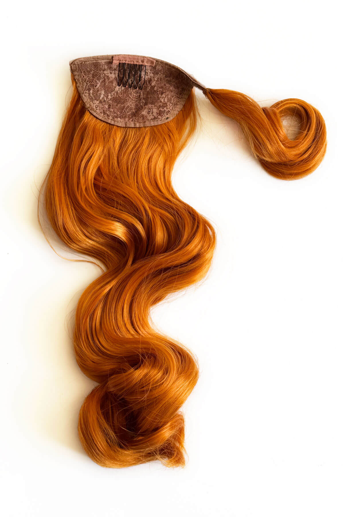 Ginger hair extension on a white background. Long ponytail hairpiece with vintage waves: Kitrysha - ginger