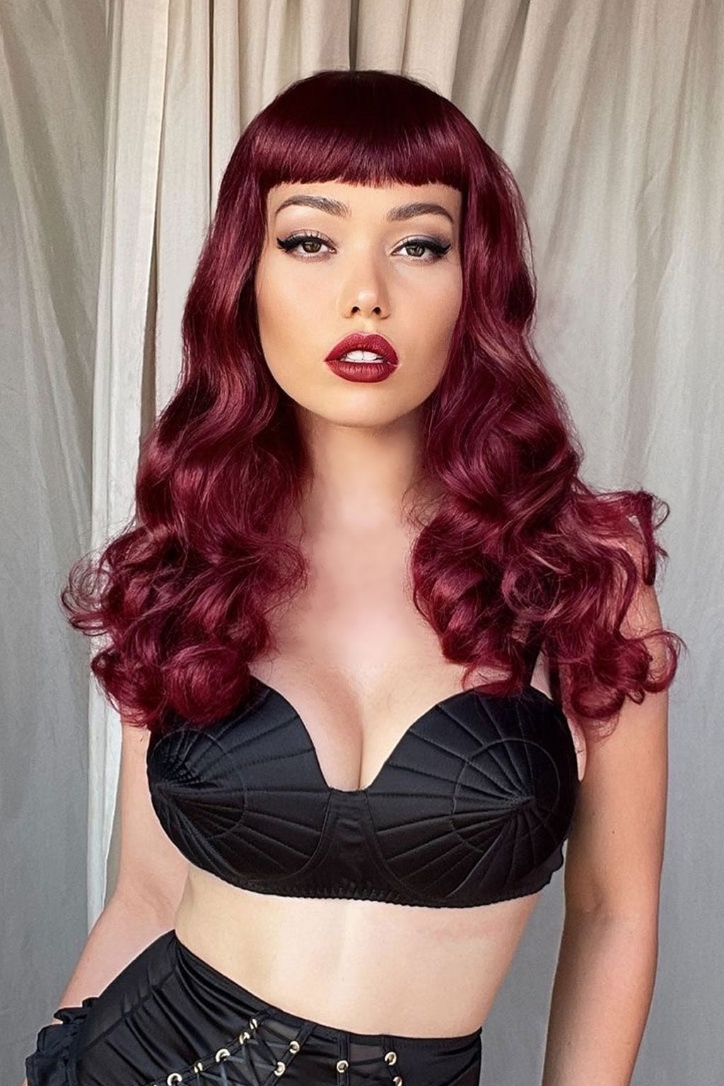 Long cherry red pin-up wig, gently wavy with short fringe: Maeve