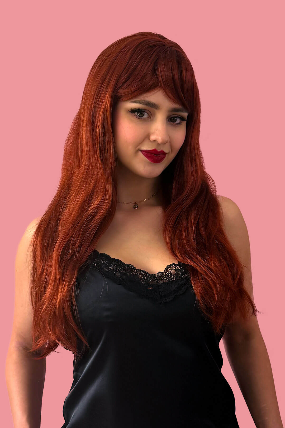 Gingery-red wig with mermaid waves and swept fringe: Roisin