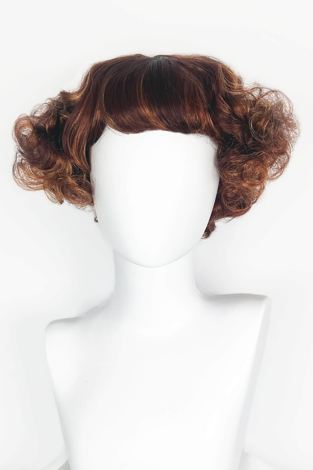 Brown wig on a white mannequin head against a white background. A short red, auburn and blonde mix vintage style wig with waves: Solana Auburn BO