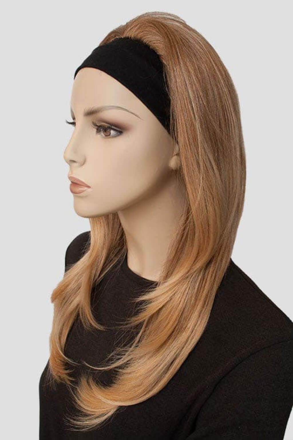 Mannequin head with a brown wig on a white background. Brown half wig hairpiece (3/4 wig), gently layered: Briar