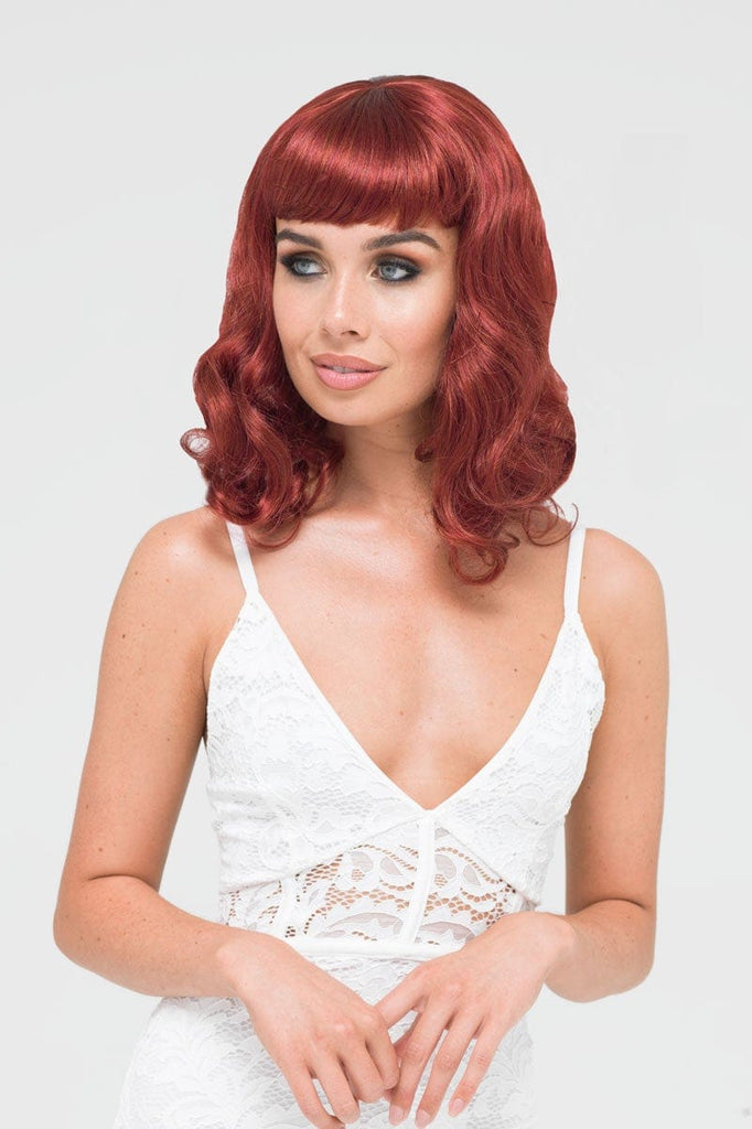 Copper red 1950s pinup wig, curled with short fringe: Kitty