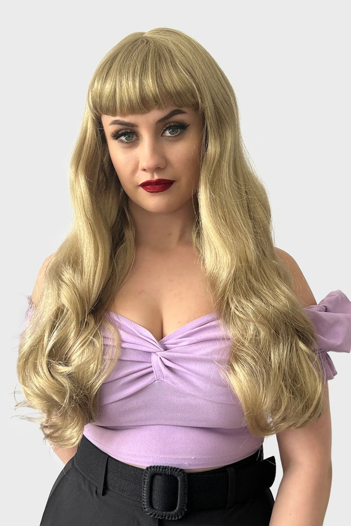 Long blonde wavy wig with pinup-style fringe: Elena