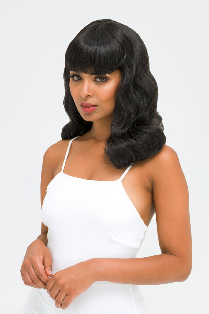 Black pinup style wig, curled with short fringe, 1950s style: Bettie
