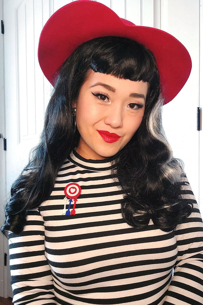 Long black 1950s pin up style wig with platinum streak and retro fringe: Michelle AnnabellesWigs