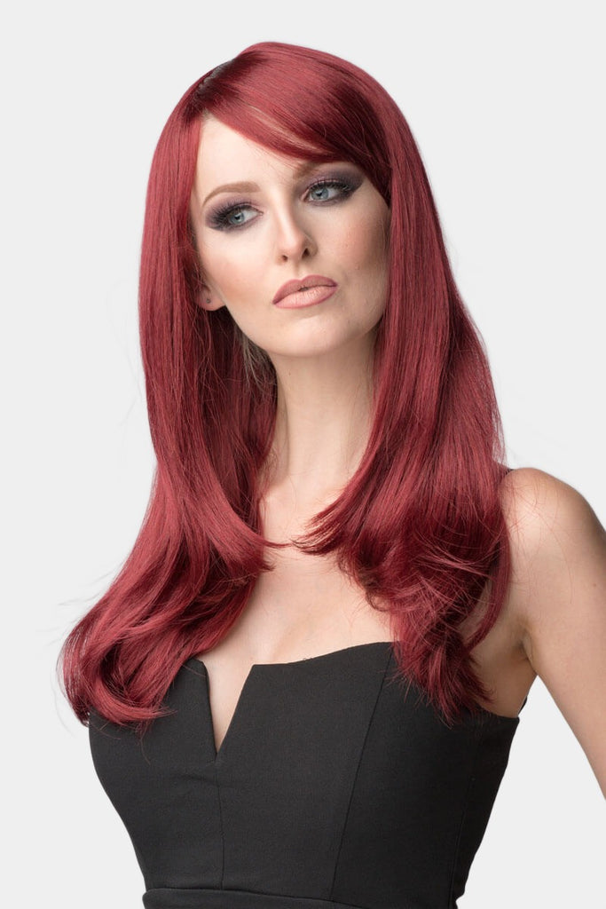 Long red wig in razor cut, face frame style: Megan