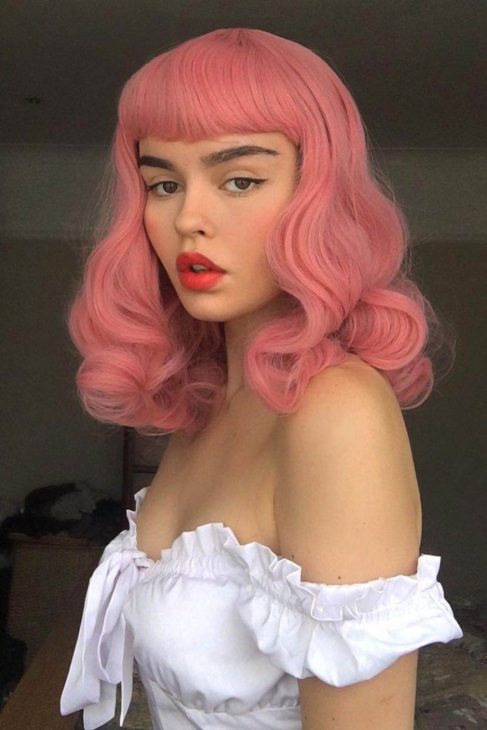 Pink pinup style wig, with finger waves and a short fringe, 1950s style: Stevie
