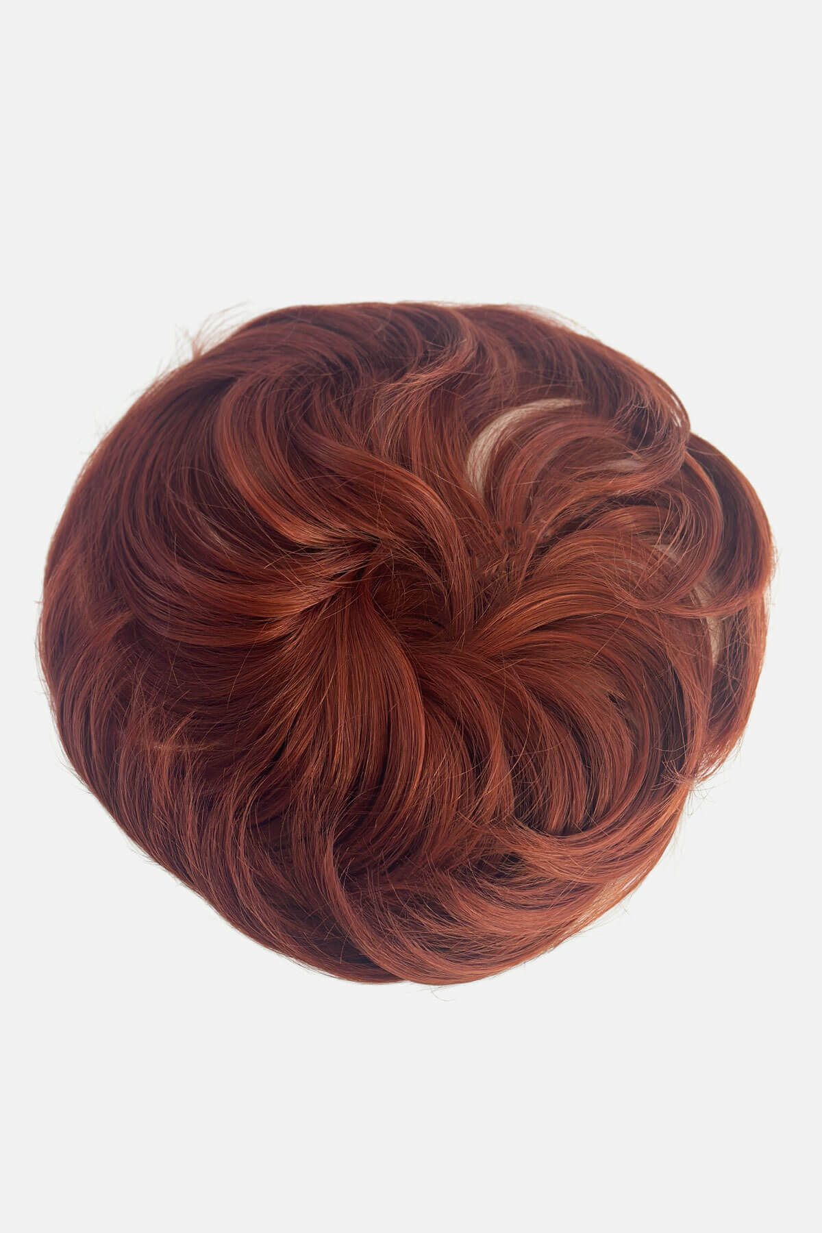 Reddish-brown hair bun on a white background. Hairpiece bun; instant perfect bun hairpiece: Hepburn copper red 130