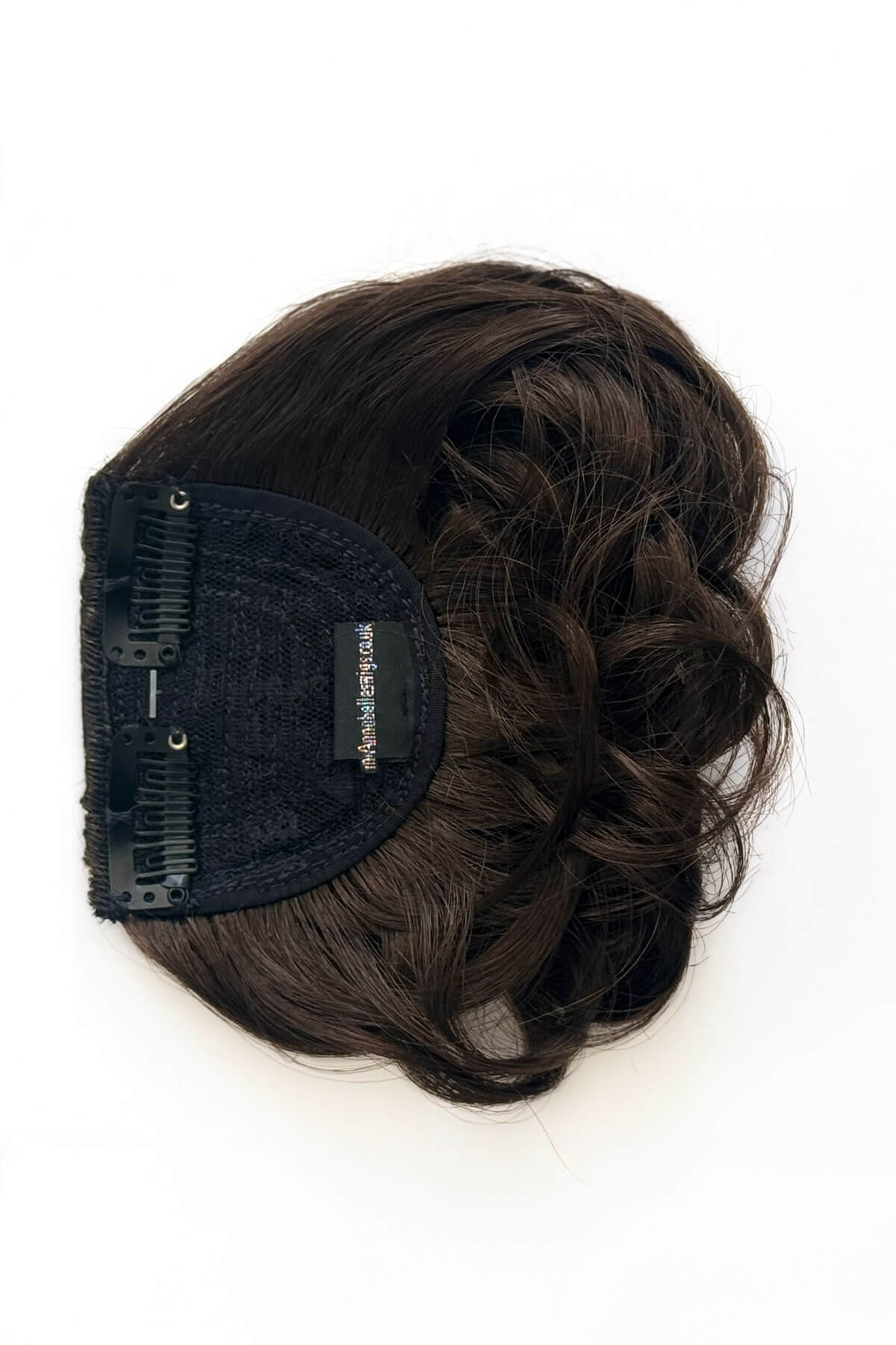 Brown hairpiece with a black clip on a white background. Curly 1940s style clip-in fringe hairpiece/clip-in bangs: Bunny brown 6