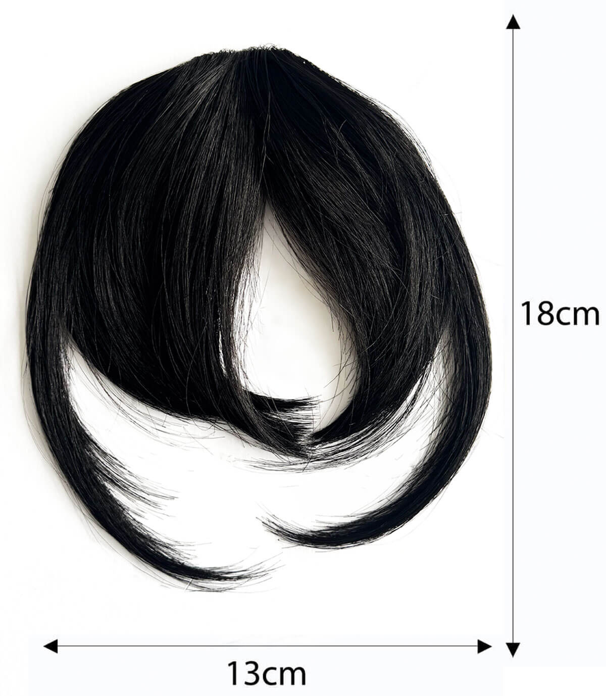 Black hair extension with measurements on a white background. Clip in fringe hairpiece/clip-in bangs, gently feathered with face framing whisps: Delia black 1B