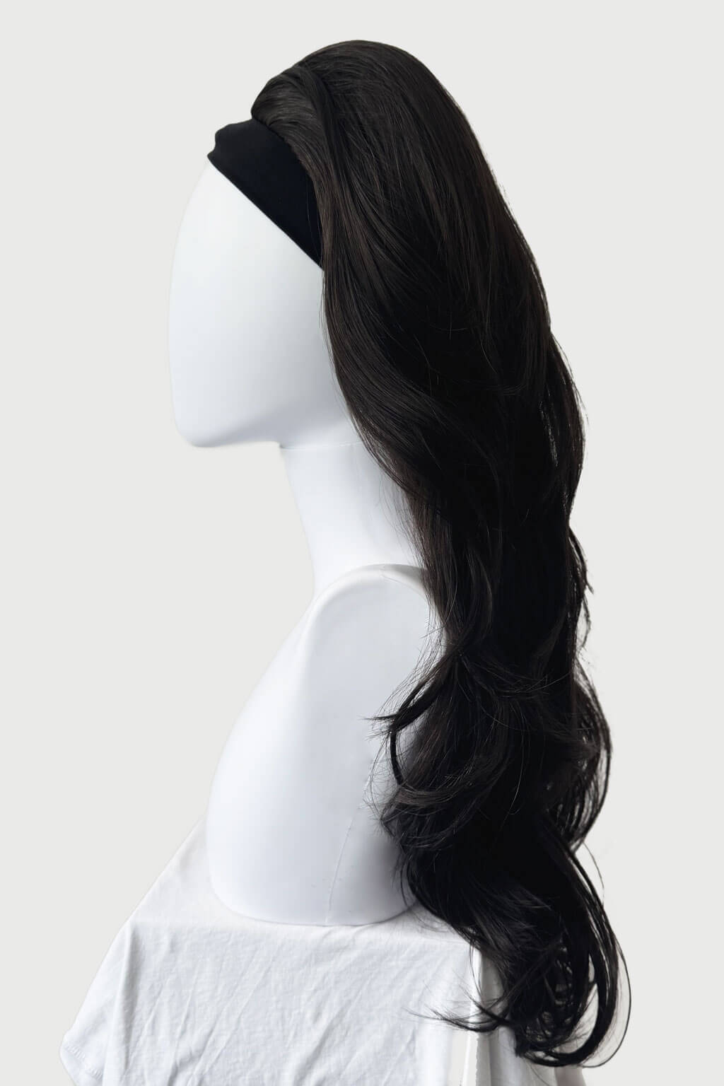 Black hair extension on a mannequin head against a white background - High crown long layered half wig and volume ring Helena dark brown 4