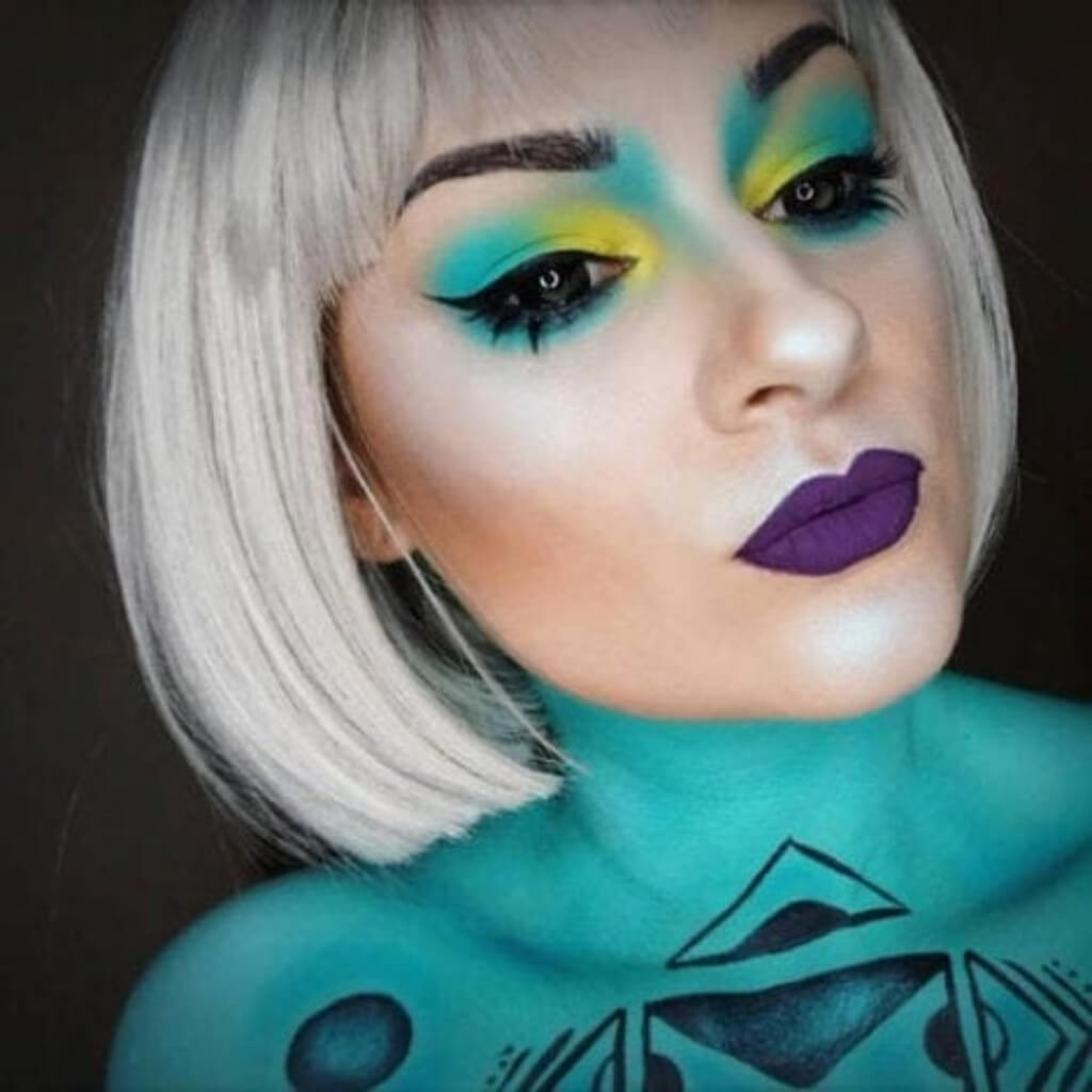 Person with vibrant makeup on a dark background. Satin-grey/silver bob wig, short and chic: Celeste