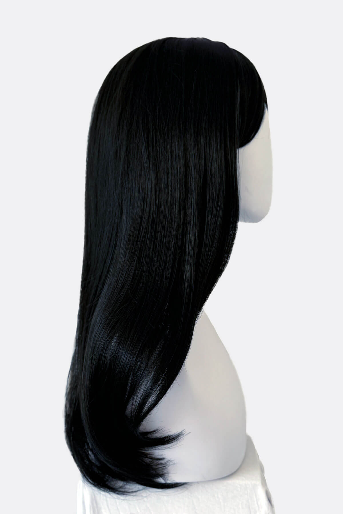 Straight black wig on a mannequin. Long black wig, face frame style with full, sweeping fringe: Corina