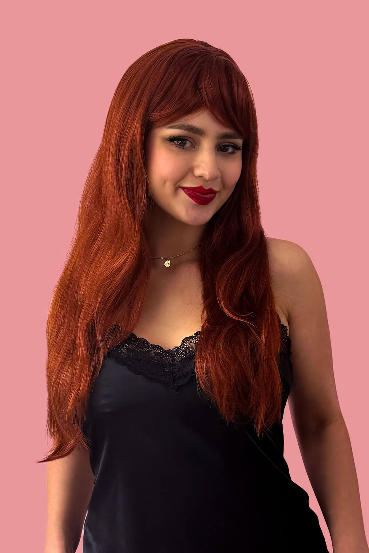Gingery-red wig with mermaid waves and swept fringe: Roisin