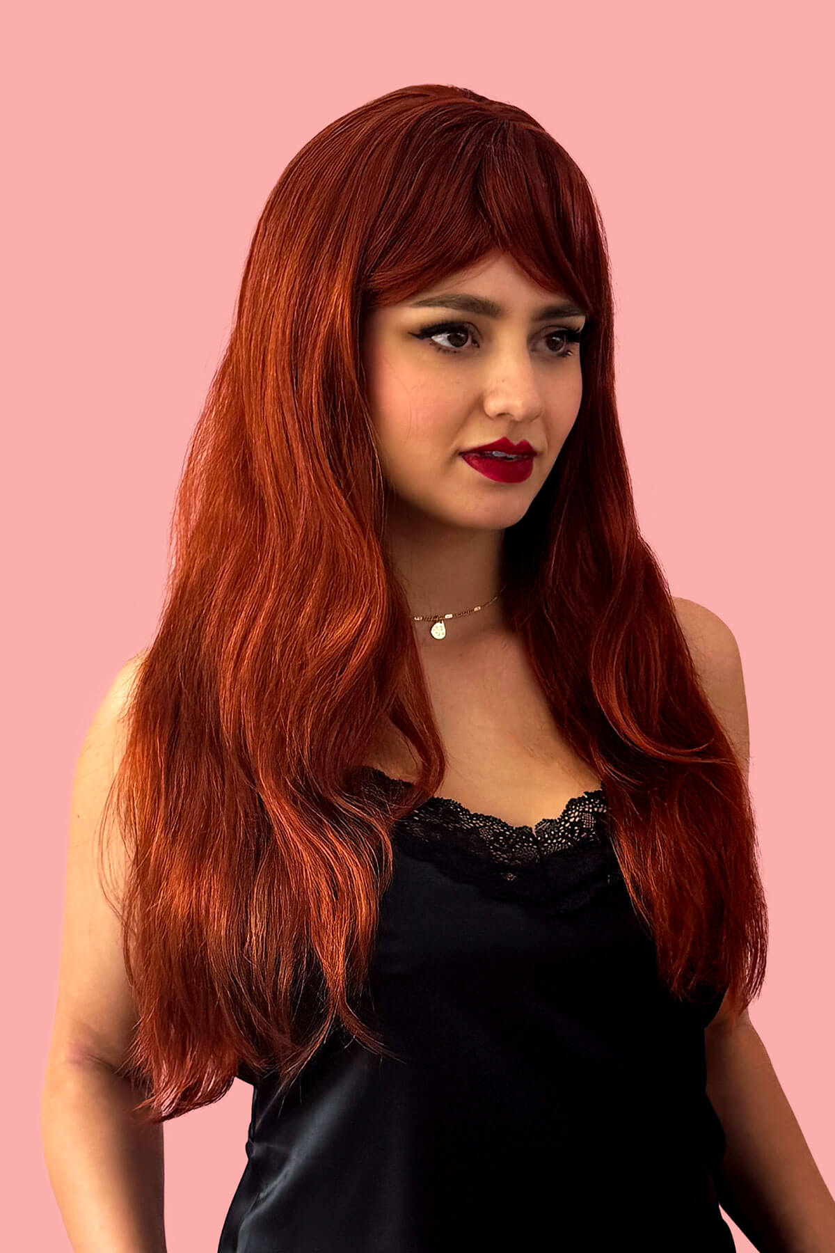 Gingery-red wig with mermaid waves and swept fringe: Roisin