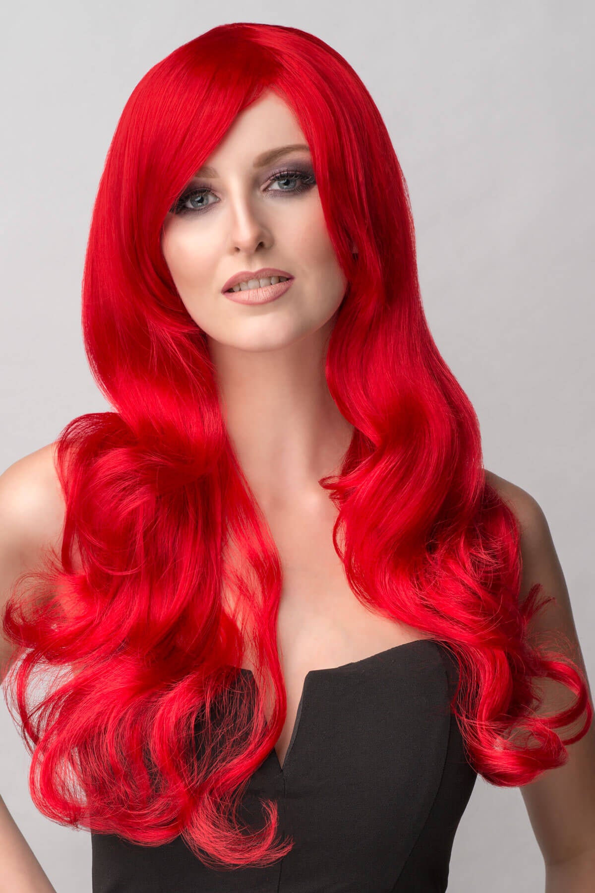 Long bright red wig with long, big loose curls: Alexis – vivid red