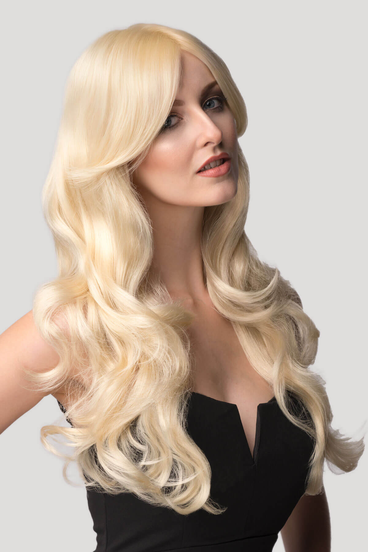 Blonde wig with big loose curls and sweeping fringe, extra long