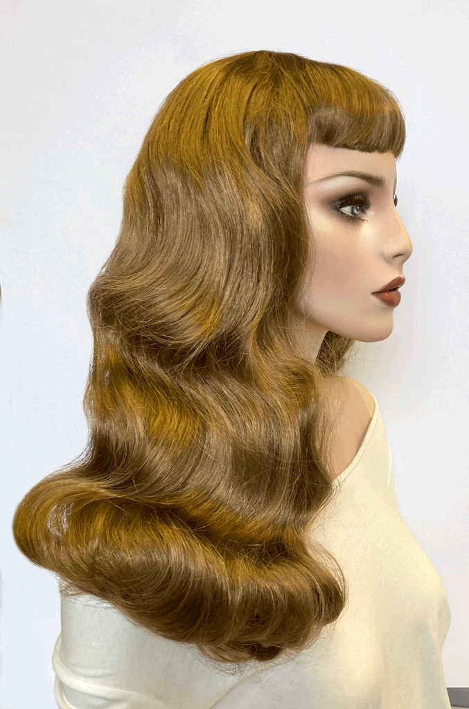 Brown 1950s pinup style wig, with long waves and a short fringe: Rosie