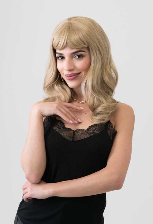 Ash blonde 50s style wig with short fringe and gentle waves: Trinity