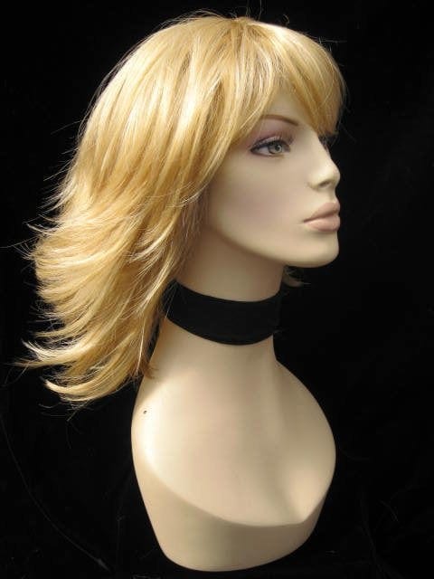 Annabelle's Wigs synthetic wig Warm blonde wig with flicked tips: Mary
