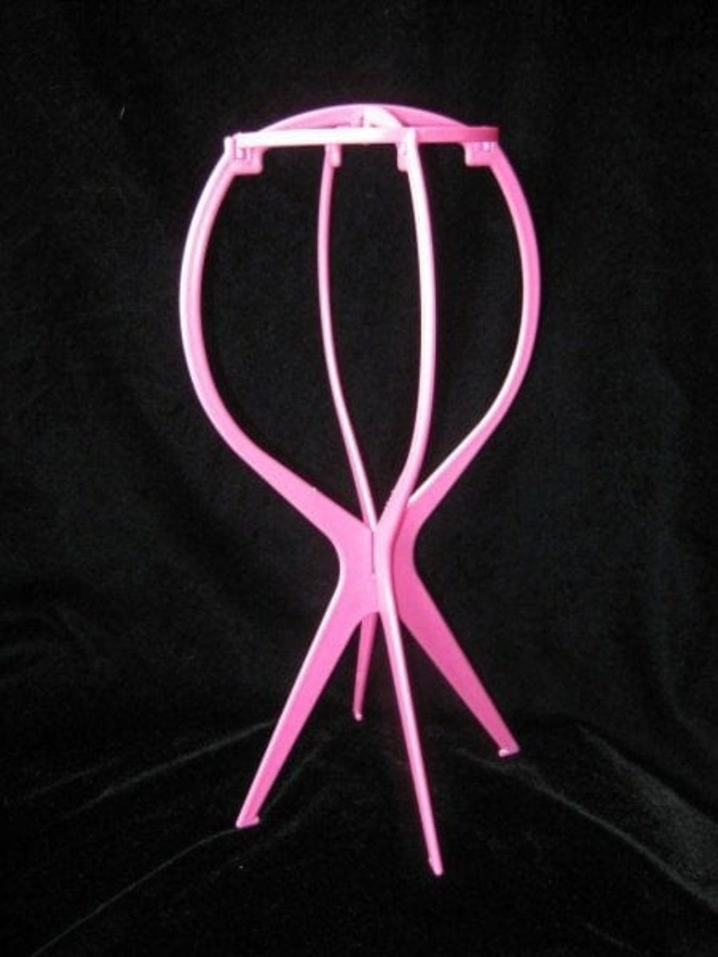 A collapsable wig stand - pink