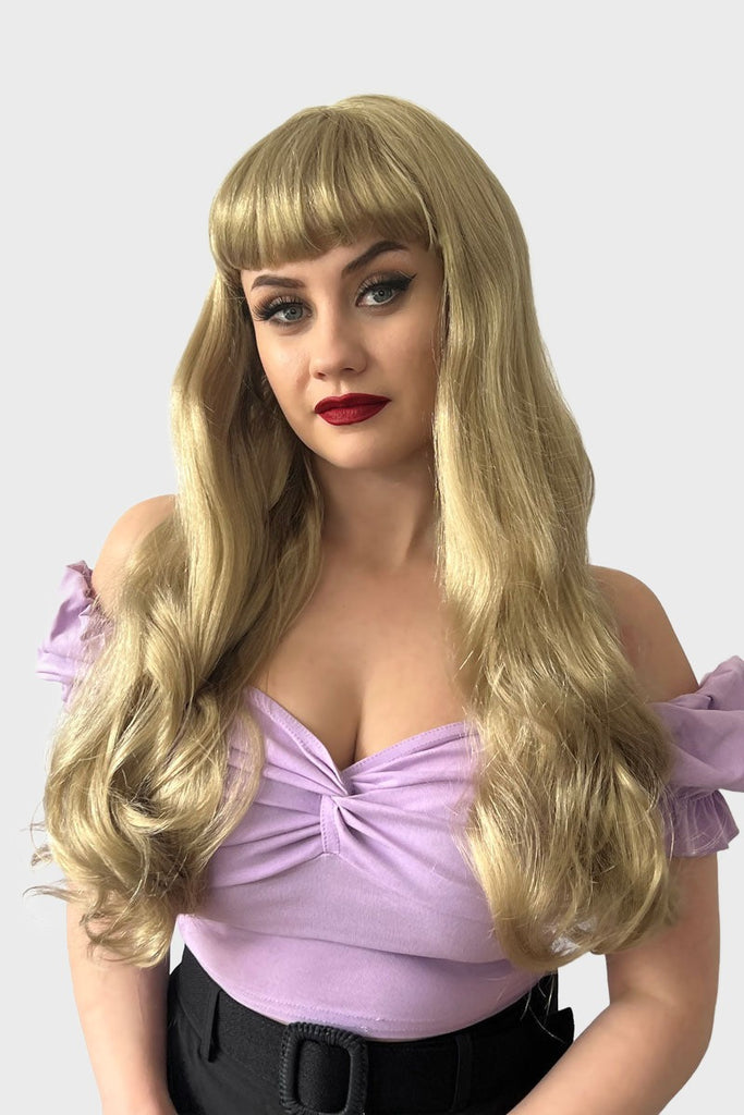 Long blonde wavy wig with pinup-style fringe: Elena