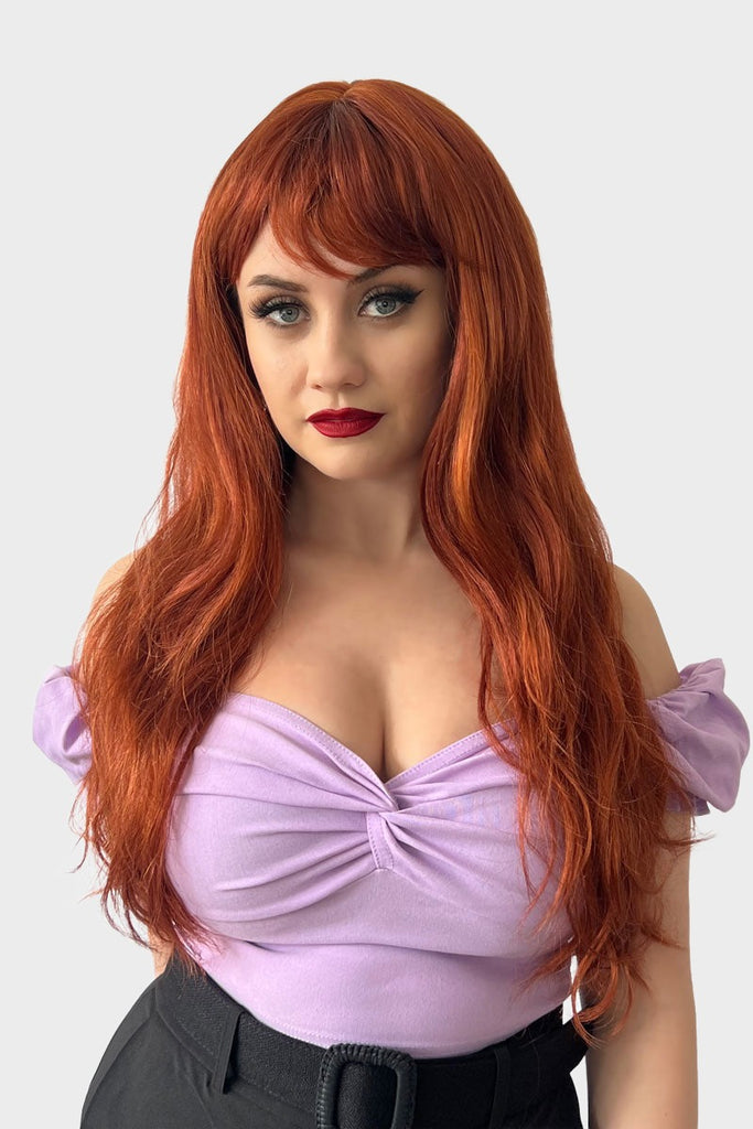 Gingery-red wig with mermaid waves and swept fringe: Roisin