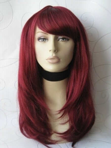 Long red wig in razor cut, face frame style: Megan